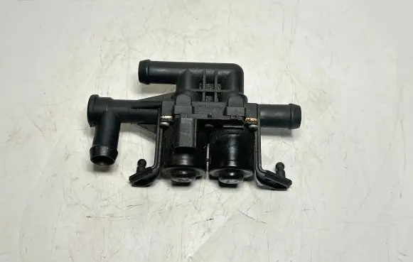 Coolant heater control valve
