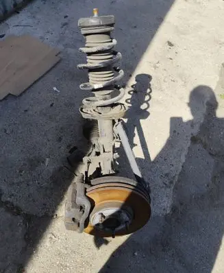 Opel Zafira C Front shock absorber with coil spring 13354037