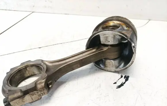 Piston with connecting rod