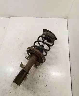 Renault Megane III Front shock absorber with coil spring