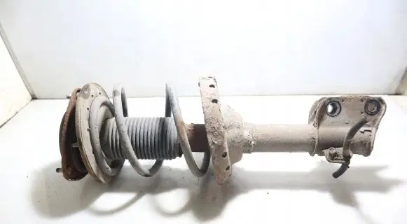 Subaru Legacy Front shock absorber with coil spring