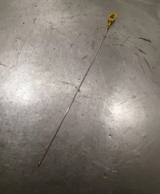 Oil level dip stick