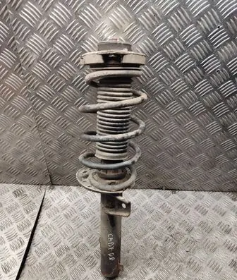 Volkswagen Caddy Front shock absorber with coil spring