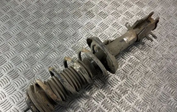 Opel Corsa D Front shock absorber with coil spring