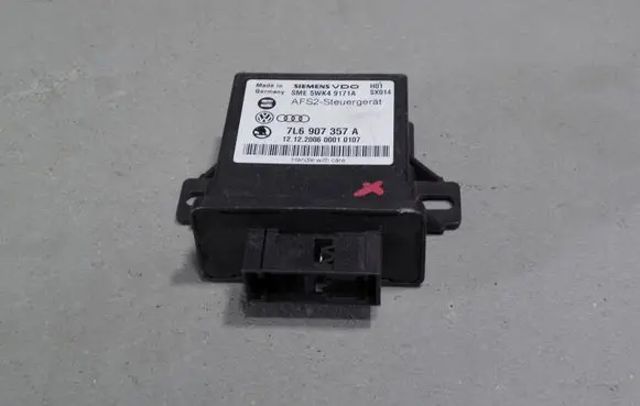 Volkswagen Touareg I Light module LCM 7L6907357A