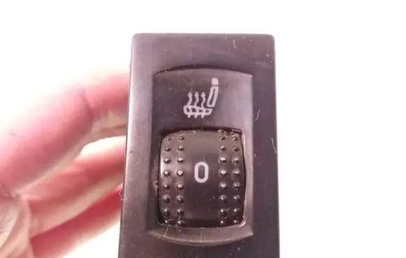 Seat heating switch