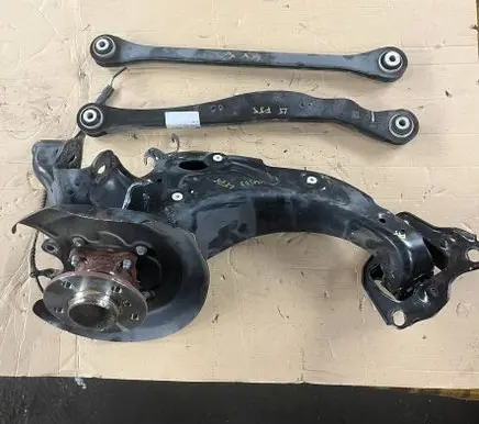 Rear wheel hub spindle/knuckle