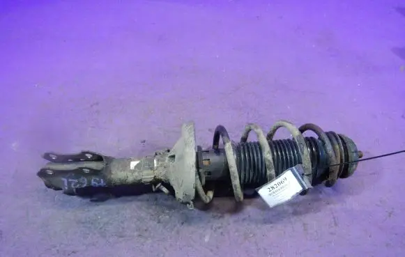 Front shock absorber with coil spring