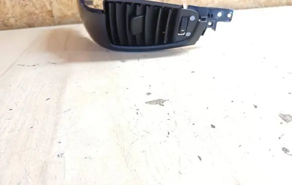KIA Sorento Dash center air vent grill 974303E500