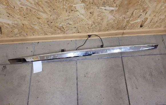 Jaguar S-Type Trunk door license plate light bar 4R8313550AE