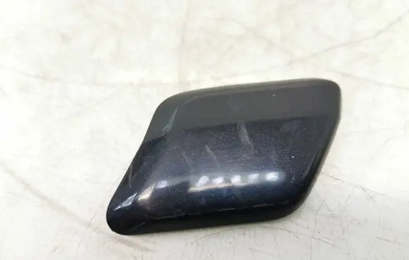 Headlight washer spray nozzle cap/cover