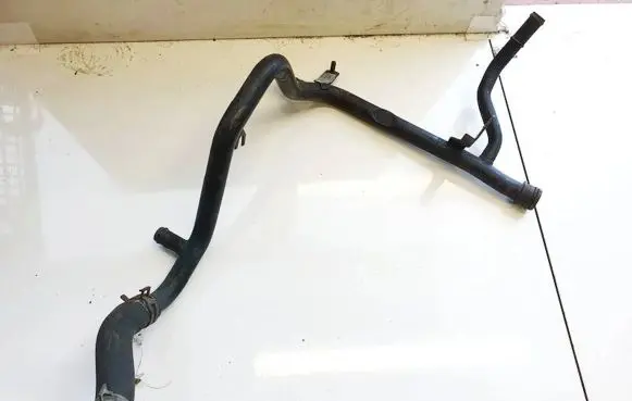Volkswagen Golf IV Engine coolant pipe/hose 06a121065d