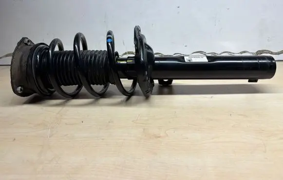 Volkswagen Golf VIII Front shock absorber with coil spring 5WA413031