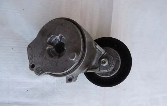 Opel Corsa F Timing belt tensioner 9841857180