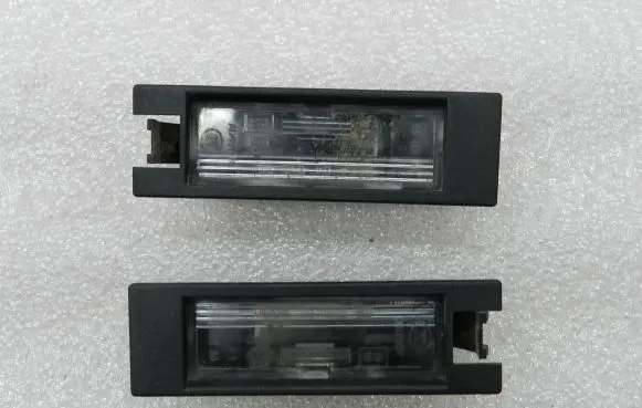 Opel Zafira B Number plate light 13200083 13252440