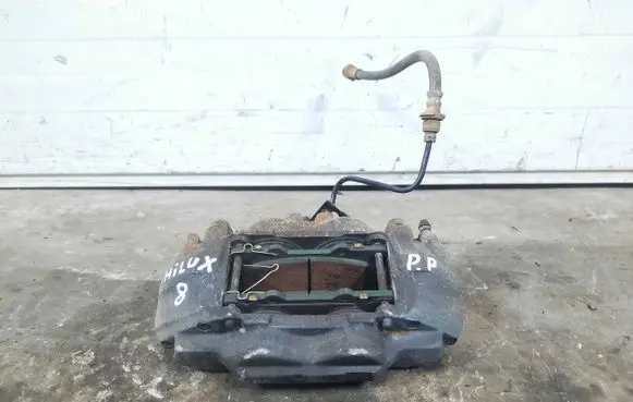Toyota Hilux VIII Front brake caliper