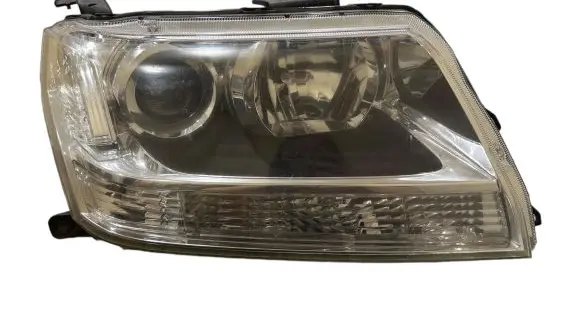 Suzuki Grand Vitara II Headlight/headlamp 10059079
