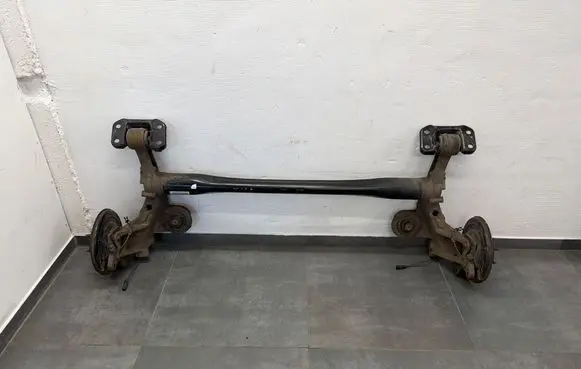 Opel Astra J Rear axle beam 703K011755