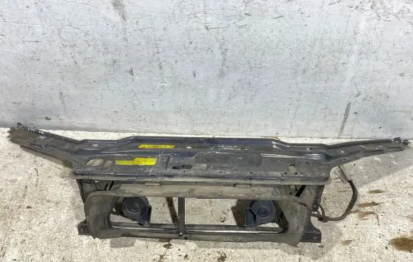 Top upper radiator support slam panel
