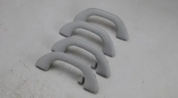 Volkswagen Tiguan A set of handles for the ceiling 1K0857607M 1K0857607N