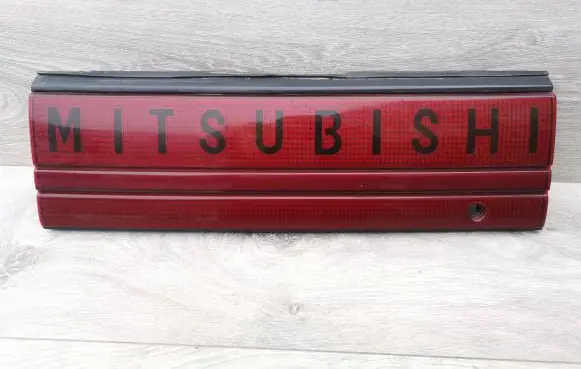 Mitsubishi Eclipse Tailgate trim MB479058 1896001 MB479056