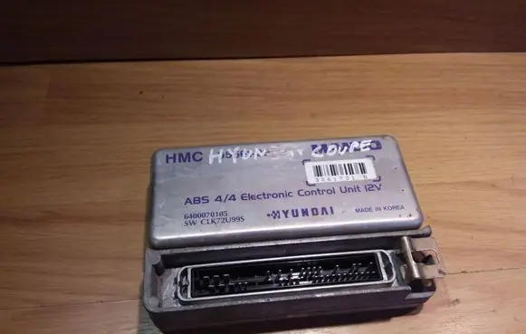 Hyundai Coupe ABS control unit/module 9566129000 6400070105