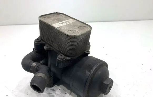 Volkswagen PASSAT B7 Oil filter mounting bracket 03L117021C