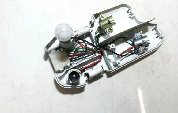 Mazda 626 Tail light bulb cover holder