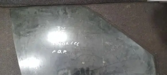 Mazda 626 Front door window glass four-door