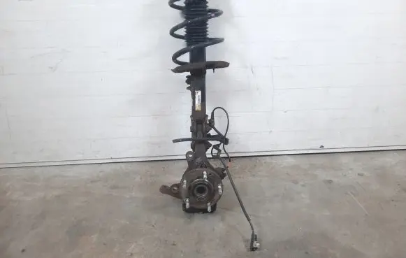 Front wheel hub spindle knuckle