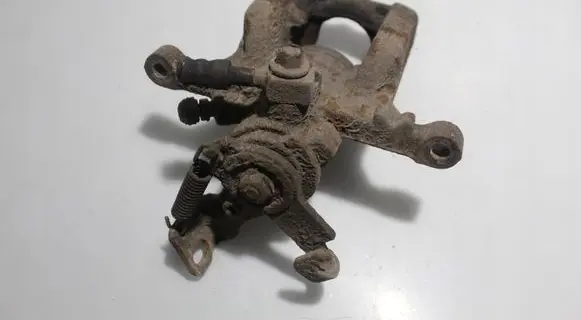 Opel Astra J Rear brake caliper