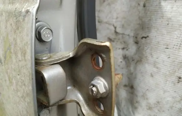 Mazda 626 Rear door lower hinge