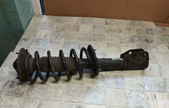 Chevrolet Captiva Front shock absorber with coil spring