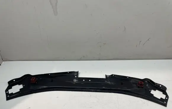 Top upper radiator support slam panel