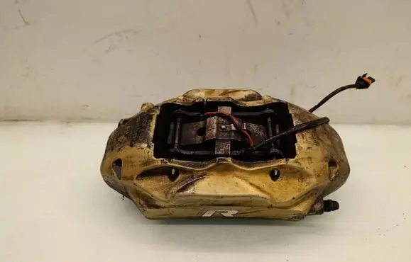 Volkswagen Touareg I Front brake caliper 