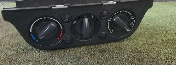 Suzuki Swift I Climate control/heater control trim 
