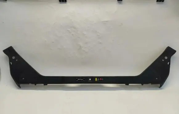 Engine bonnet/hood lock trim molding