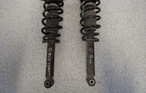 Nissan Primera Front shock absorber with coil spring 
