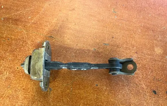 Nissan Almera N16 Front door check strap stopper