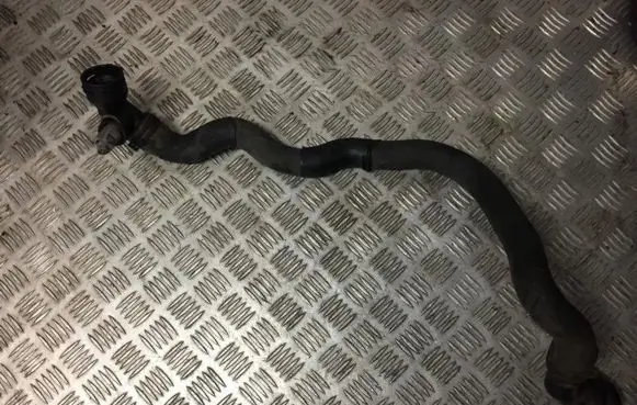 Volkswagen Golf V Engine coolant pipe/hose 06A121121C 038121121D