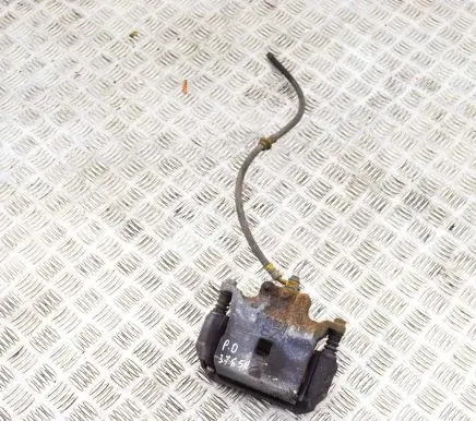 Nissan Juke I F15 Front brake caliper