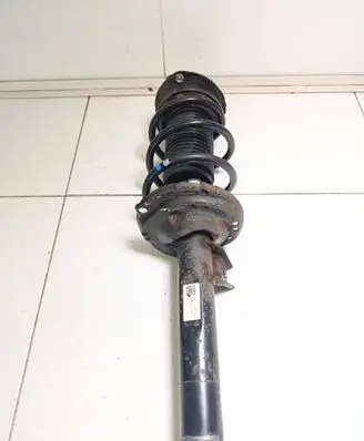 Volkswagen Golf VII Front shock absorber with coil spring 5Q0413023FK