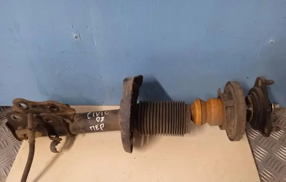 Honda Civic Front shock absorber with coil spring 21063010