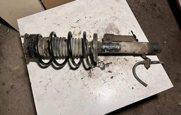 Ford Fiesta Front shock absorber with coil spring 2S6118K001DD 2S615B451