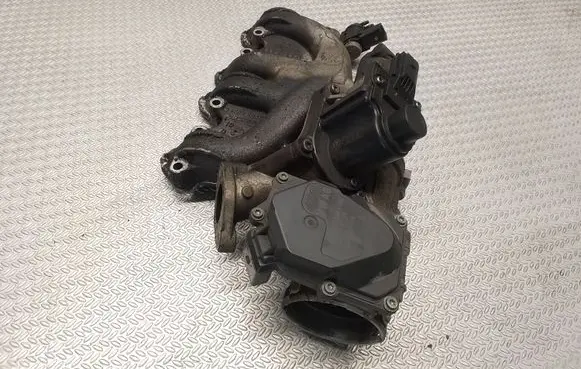 Volkswagen Caddy Intake manifold 030129713K