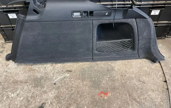 Trunk/boot lower side trim panel