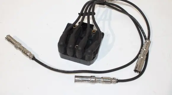 Volkswagen Caddy High voltage ignition coil 06A905097A