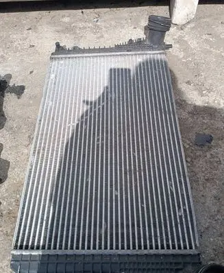 Volkswagen Golf V Intercooler radiator 1K0145803E