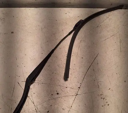 Front wiper blade arm