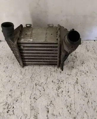 Volkswagen Golf III Intercooler radiator 1H0145805B